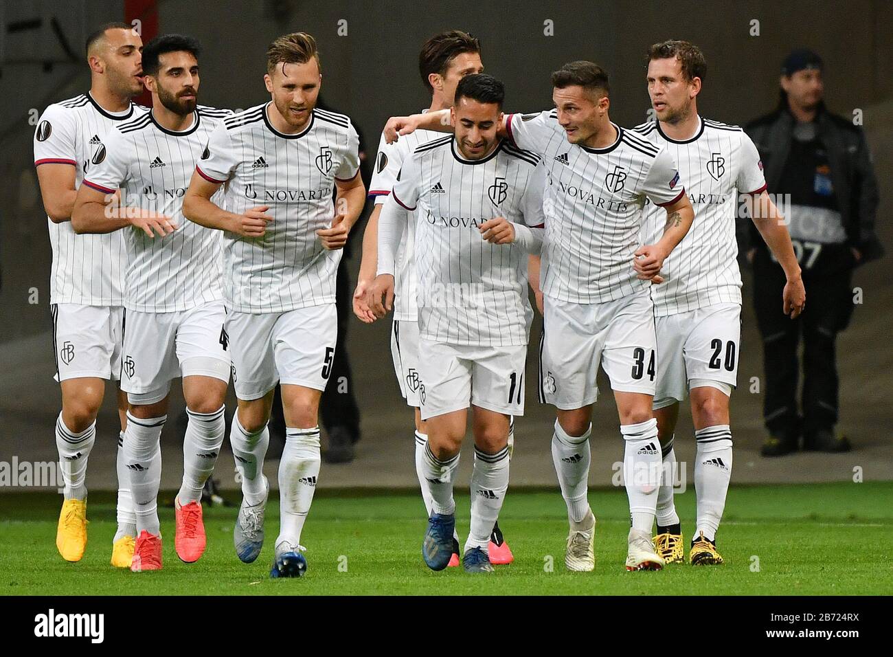 Frankfurt, Germany. 12th Mar, 2020. Samuele Campo (3rd R) of Basel  celebrates scoring with his teammates during the UEFA Champions League  round of 16 first leg match between Eintracht Frankfurt and FC