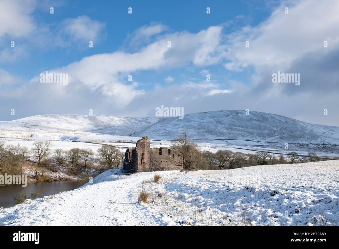 Morton Castle in the winter snow in the hills above Nithsdale. Dumfries
