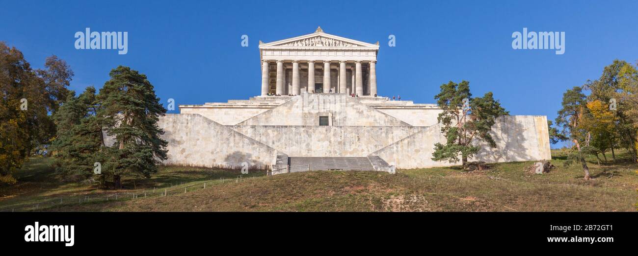 Frontal view (panorama) on Walhalla memorial. Hall of fame of german personalities. Classicist building with columns / pillars; made out of limestone. Stock Photo