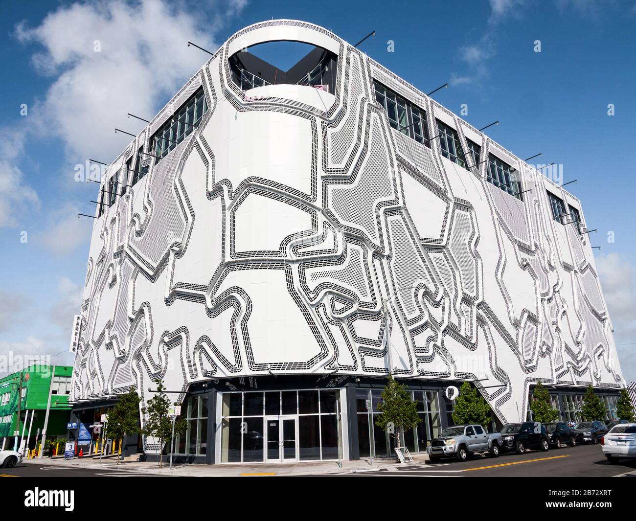 The Wynwood Garage facade, Miami, Florida. July 2019. Beautiful wide-angle shot of this unique contemporary building in the art district of Miami. Stock Photo