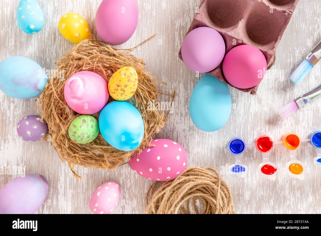 Home made painted easter eggs lay flat concept image - holidays and celebrations. Stock Photo