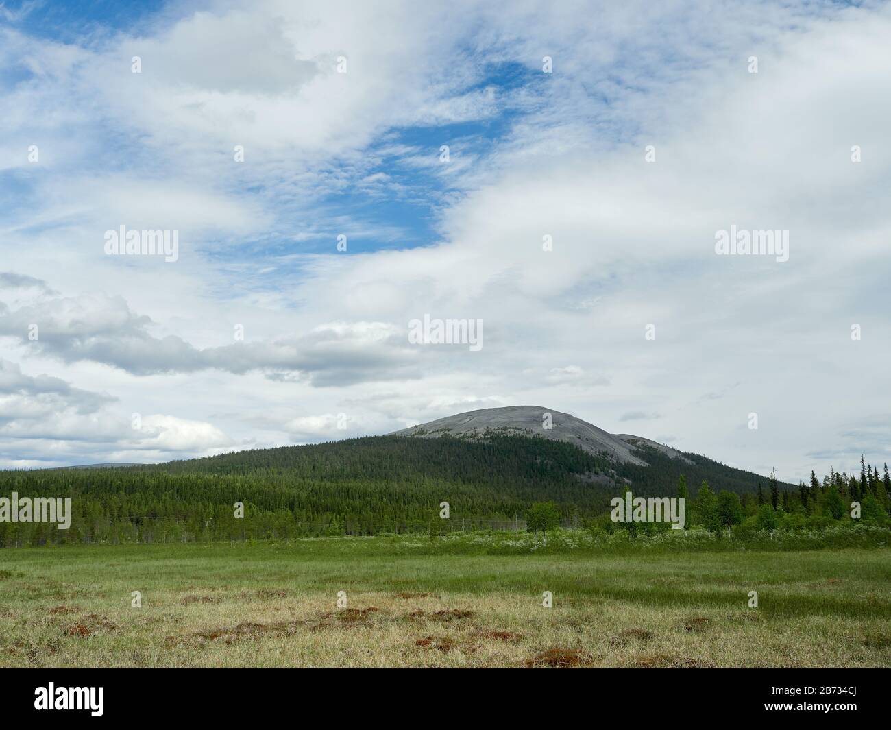 Beautifull summer scene with idyllic Yllas fell in the background in Akaslompolo, Kolari, Finland Stock Photo