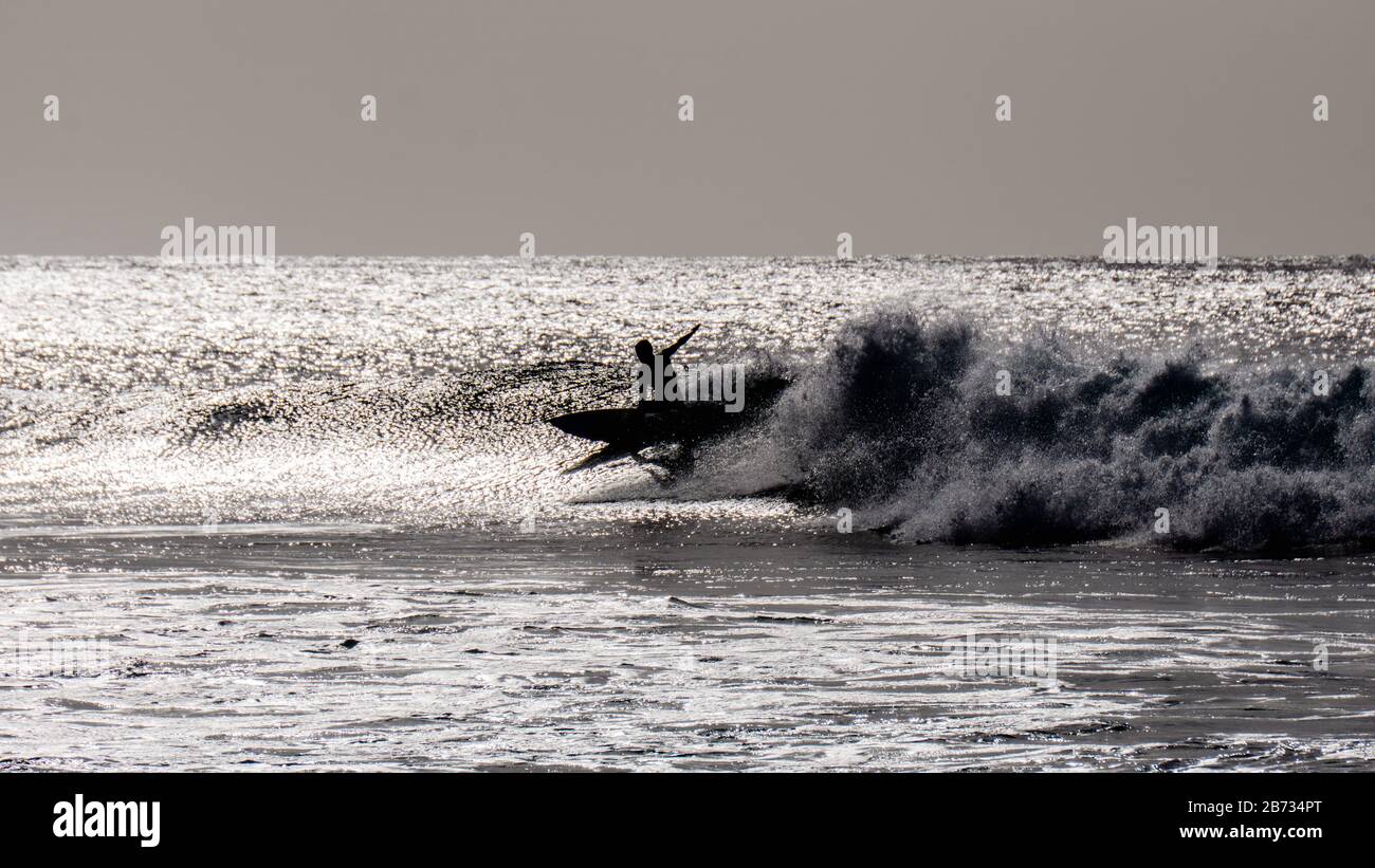 Surfing in Tarrafal, Santiago Island, Cabo Verde, Cape Verde, green islands, Atlantic ocean, Volcano island, Stock Photo
