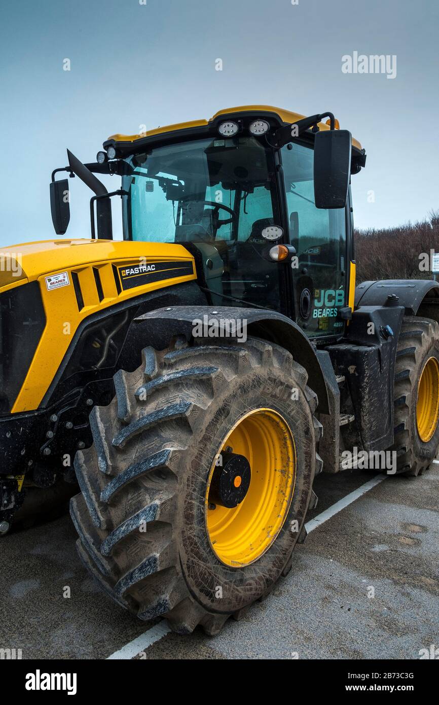 A JCB Beares Fastrac Agricultural Tractor parked in a car park in Newquay in Cornwall UK. Stock Photo