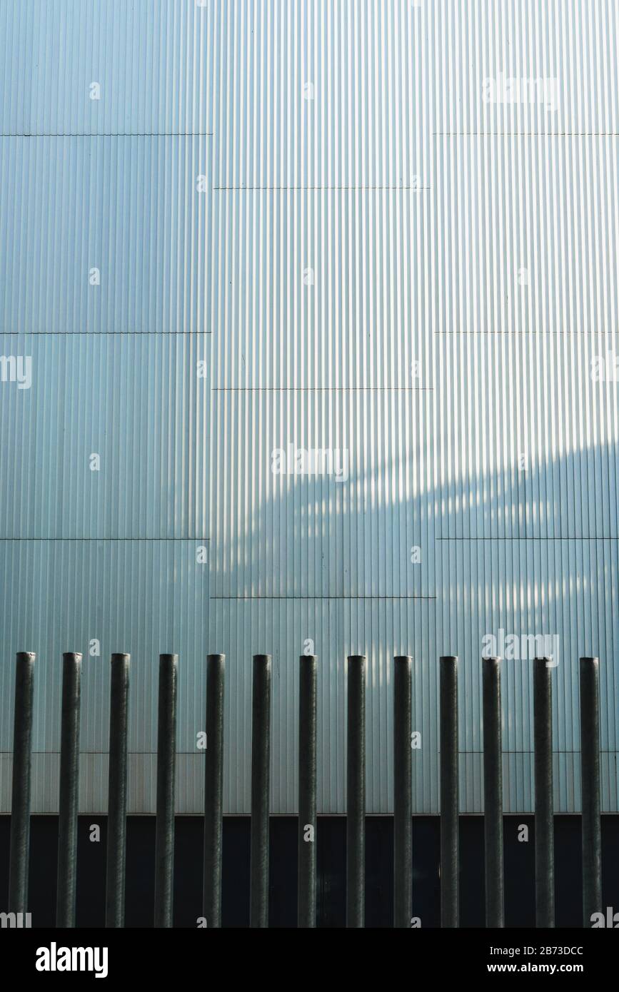 Corrugated aluminum plate building with steel bars, vertical image