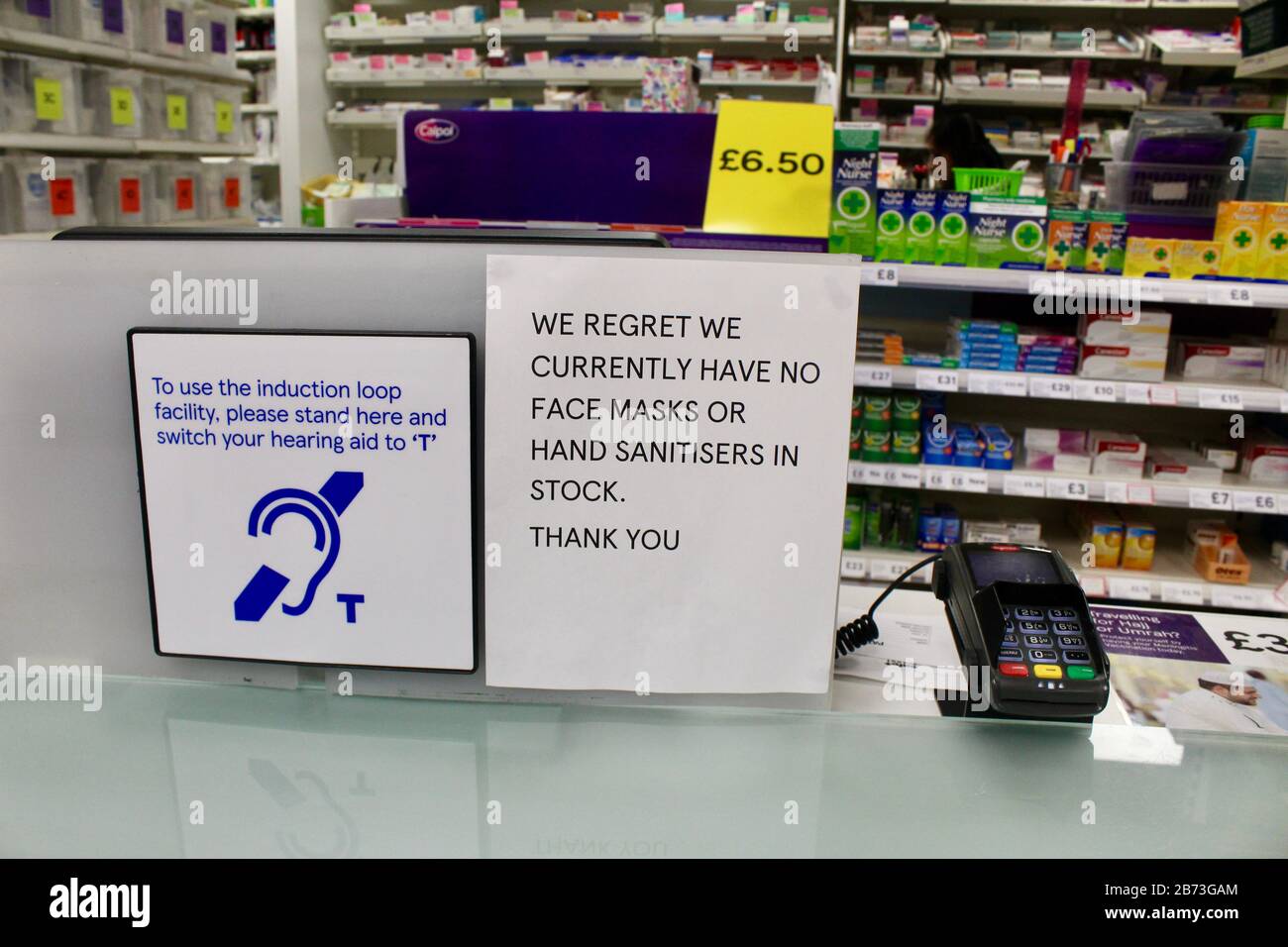 face masks and hand sanitiser sold out sign in tesco colney hatch