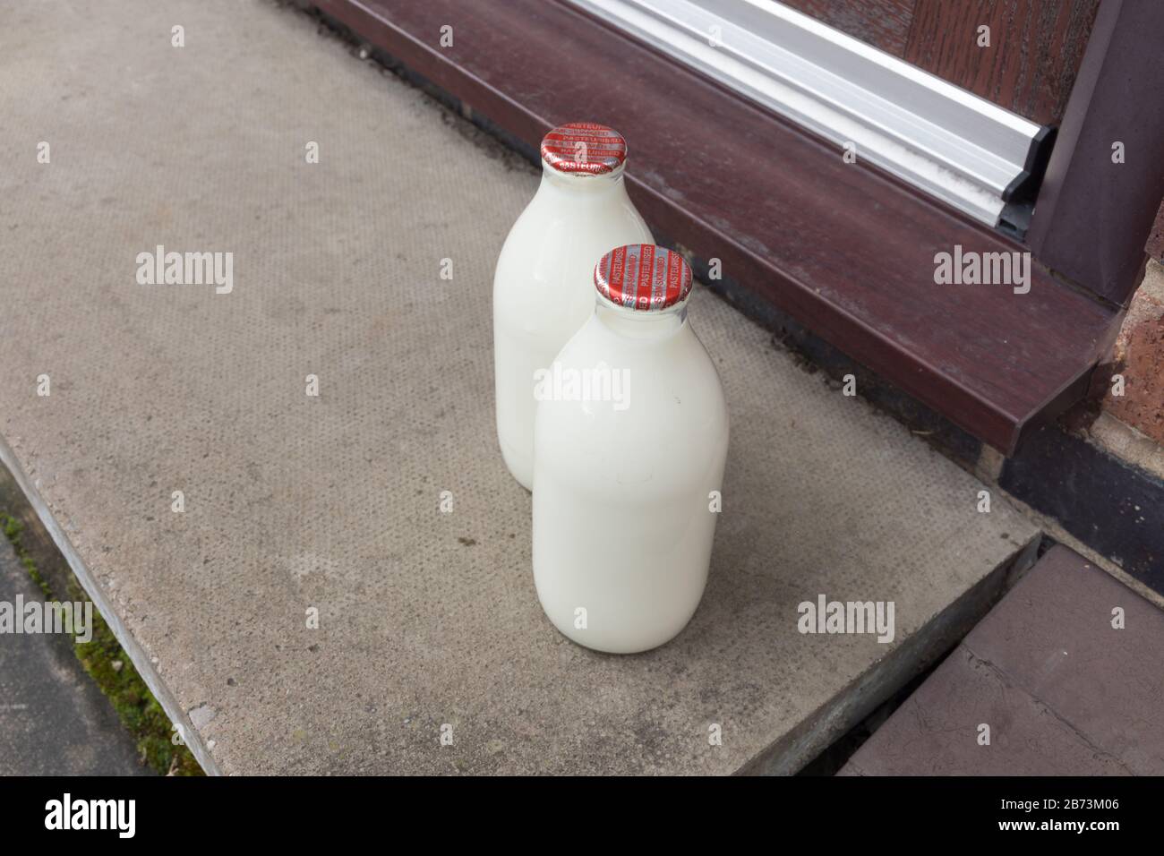 Fresh milk in recyclable glass pint bottles delivered to the door step