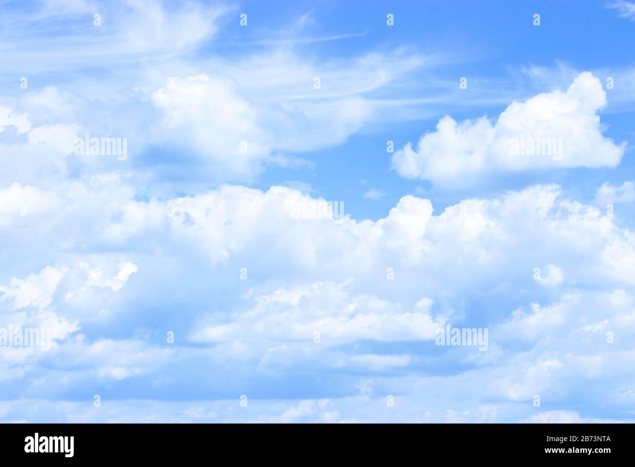 sunny cloudscape blue sky with white cumulus clouds cloudscape. Beautiful nature background backdrop sky. Bright sunny day, meteorology weather idylli Stock Photo