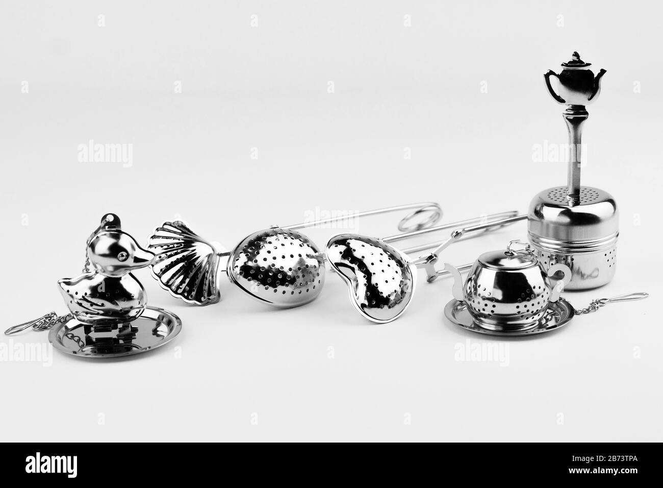 Different kinds of stainless tea strainers isolated on white background Stock Photo Alamy