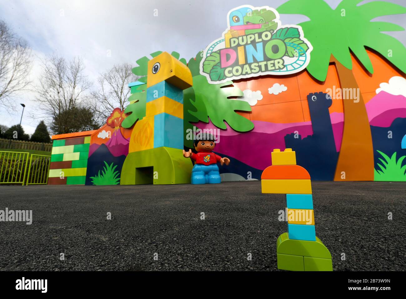 Finishing touches are made to the world's first DUPLO Dino coaster at LEGOLAND Windsor Resort, Berkshire, as part of a makeover of the bigger and better DUPLO Valley land which opens to the public on Saturday 14 March. Stock Photo