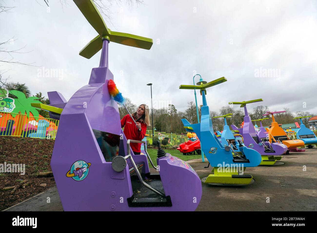 LEGOLAND Windsor team member Laura cleans the DUPLO Valley airport at LEGOLAND Windsor Resort, Berkshire, as part of a makeover of the bigger and better DUPLO Valley land which opens to the public on Saturday 14 March. Stock Photo