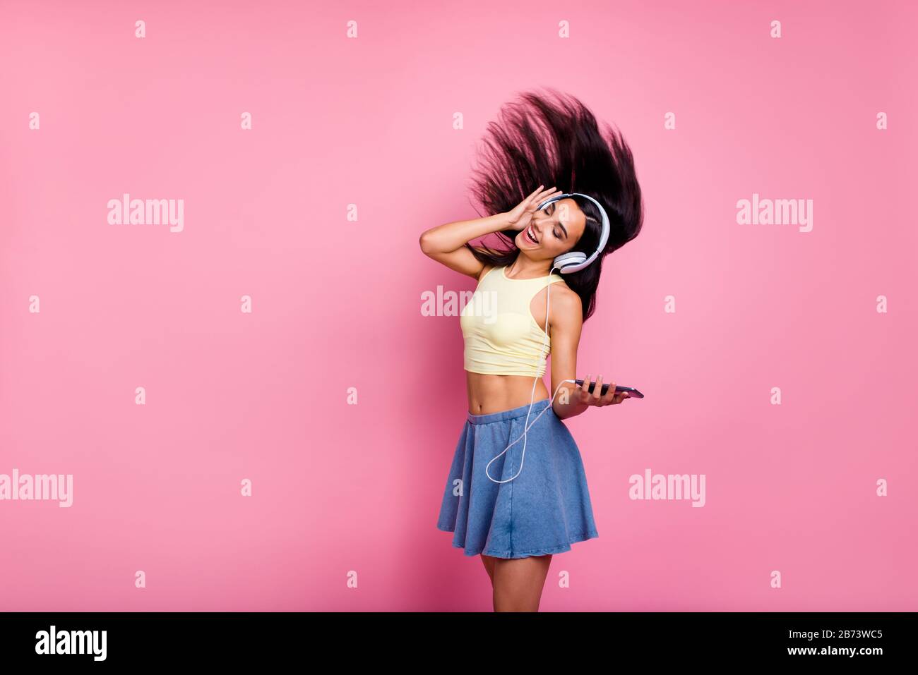 Portrait of her she nice-looking lovely sweet slim fit thin attractive shine cheerful cheery carefree girl having fun hobby isolated over pink pastel Stock Photo