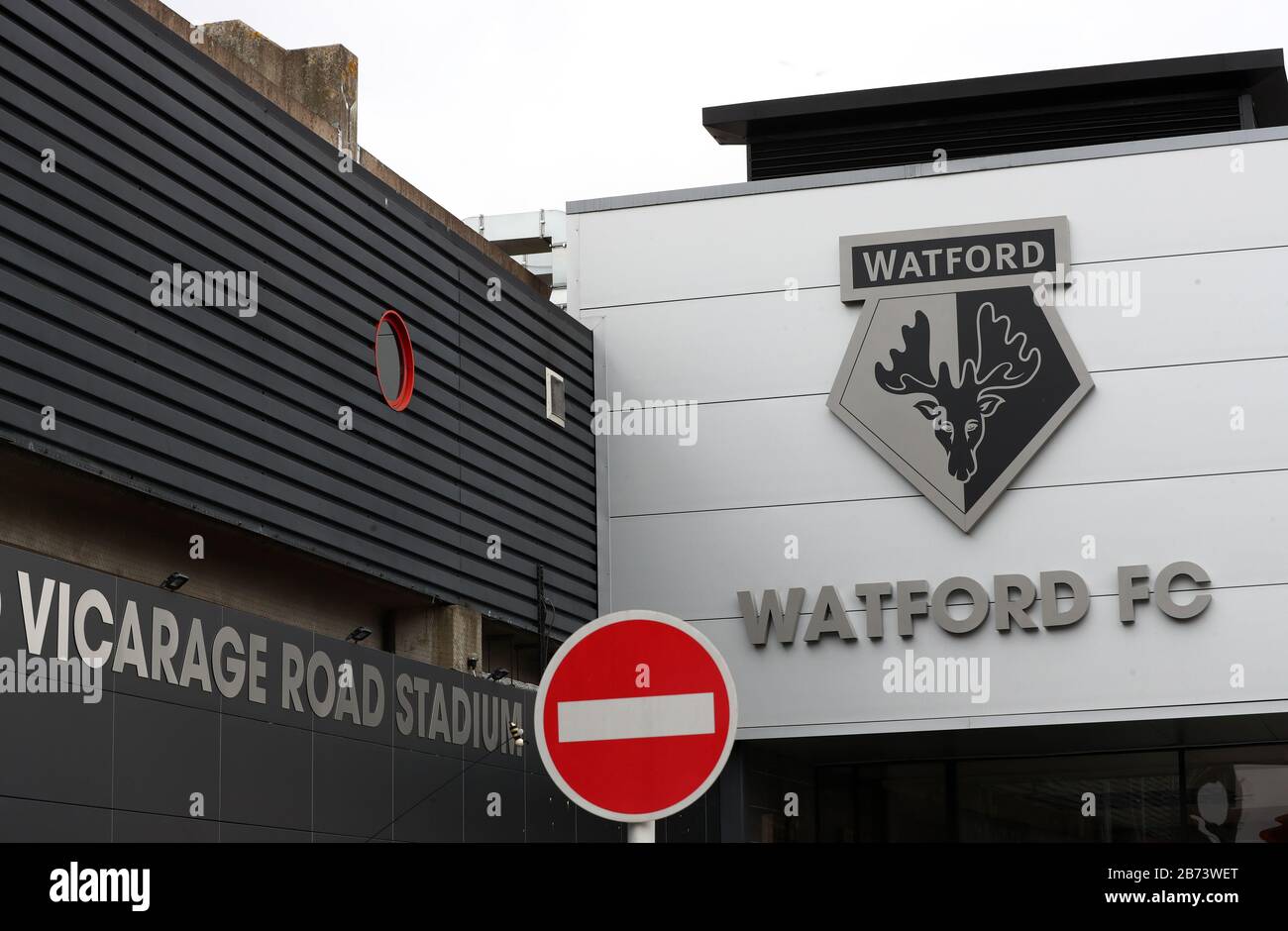 A view a stop sign outside of Vicarage Road, home of Watford FC after the Premier League has been suspended until April 4, the Football Association has announced. Stock Photo