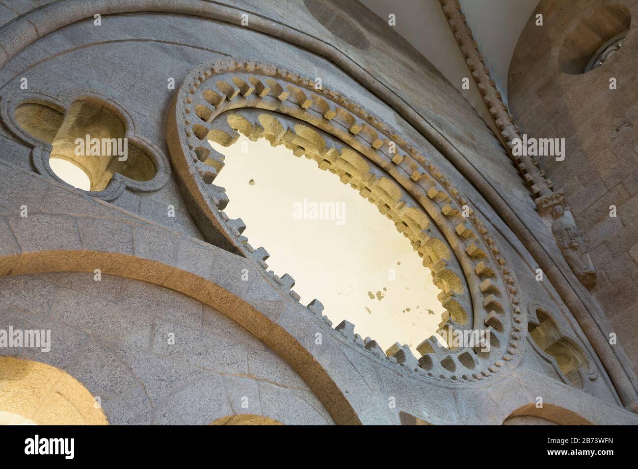 An oculus overlooks the central nave of the Cathedral of Santiago de Compostela in Galicia, Spain. The city is the terminus of the Way of St. James, t Stock Photo