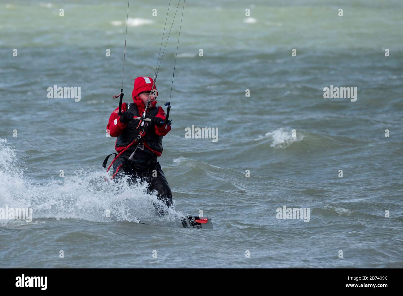 Person Kite Surfer on open water Stock Photo
