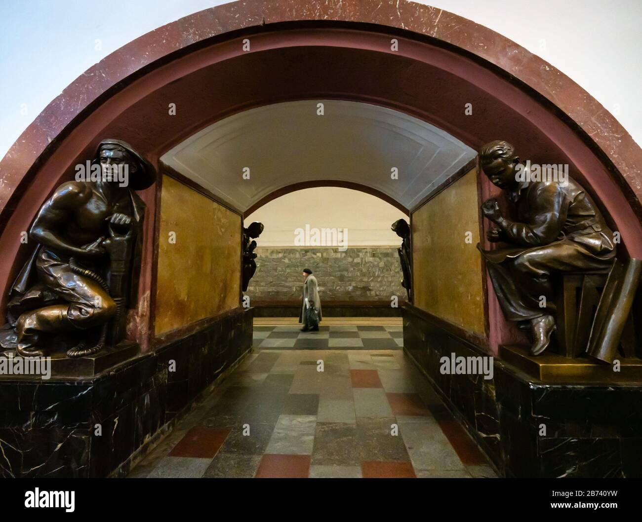 Sculptures on arch at Revolution Square or Ploshchad Metro station, Moscow, underground or subway, Russian Federation Stock Photo