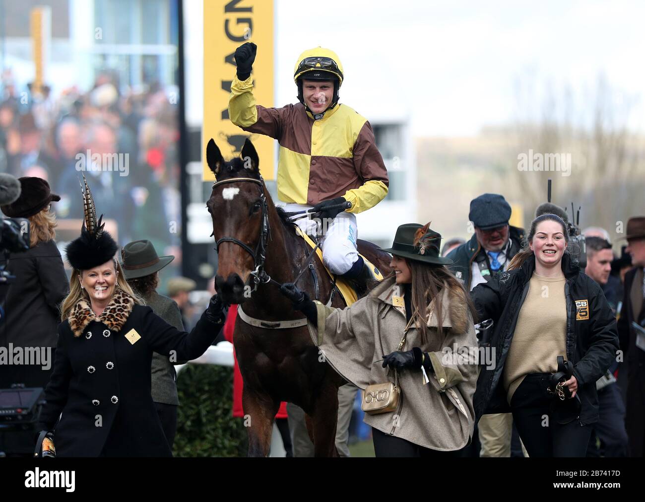 Paul Townend celebrates on Burning Victory after winning the JCB Triumph Hurdle during day four of the Cheltenham Festival at Cheltenham Racecourse. Stock Photo