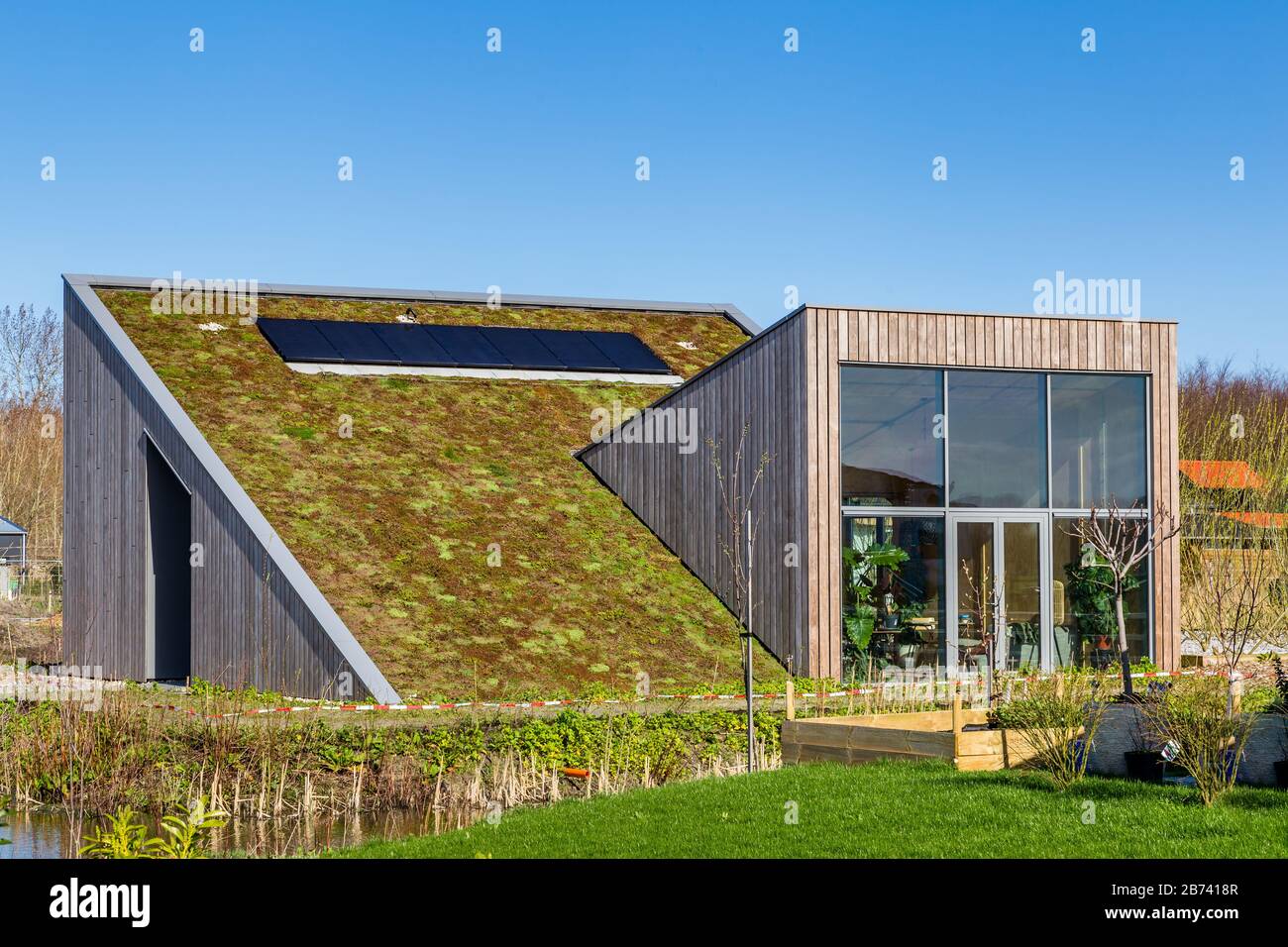 Almere, Netherlands,March 12, 2020: Modern Eco friendly tiny house in experimental new sustainable district Oosterwold in Almere. Stock Photo