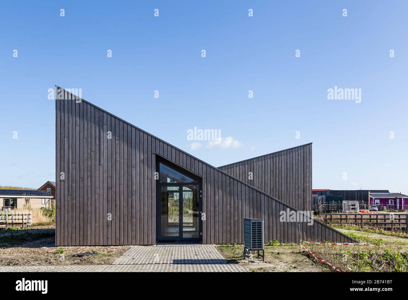 Almere, Netherlands,March 12, 2020: Modern Eco friendly tiny house in experimental new destrict Oosterwold in Almere. Stock Photo
