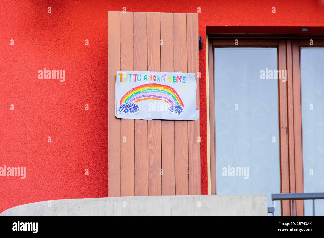 Covid-19 or Corona Virus outbreak in Bergamo. Children makes artwork to sustain the fight against the virus. Stay home, everything will be alright Stock Photo