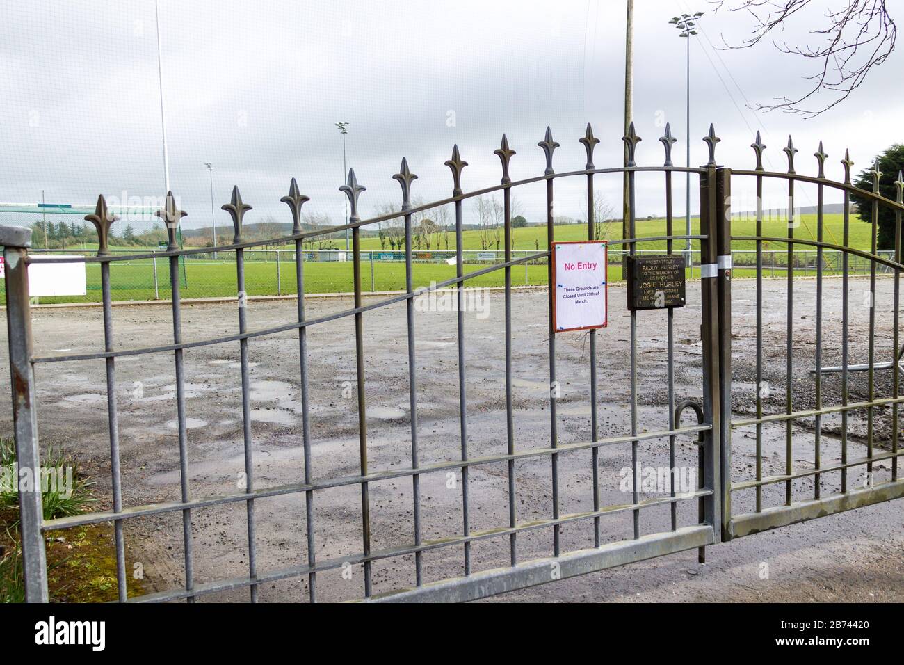 Castlehaven, West Cork, Ireland, 13th March 2020. Castlehaven GAA ground is behind closed and padlocked gates as matches are postponed due to the Coronavirus spread. Other grounds are following suit. Credit aphperspective/ Alamy Live News Stock Photo