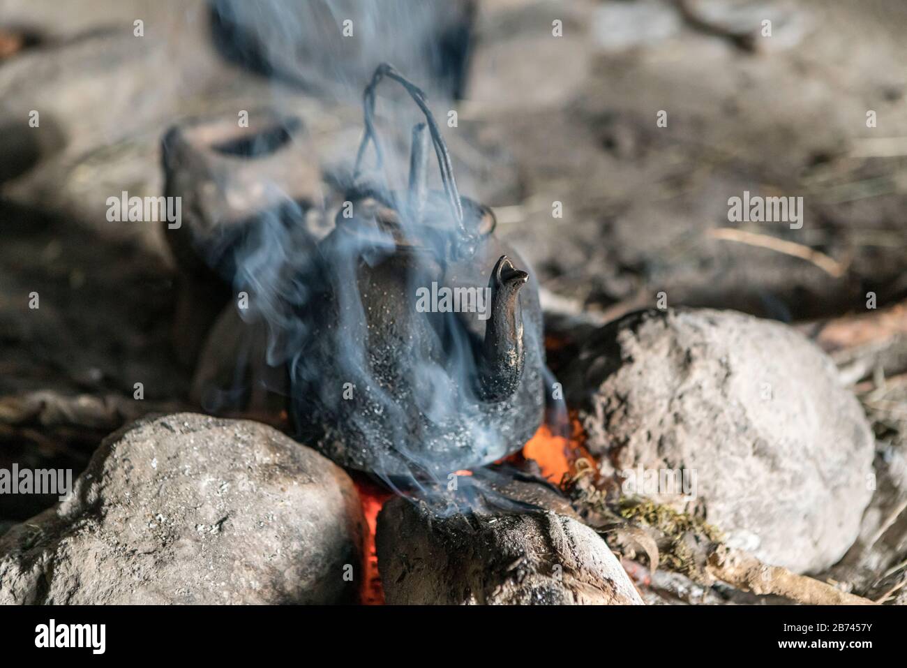 Brewing coffee over an open fire, Simien Mountains, Ethiopia Stock Photo