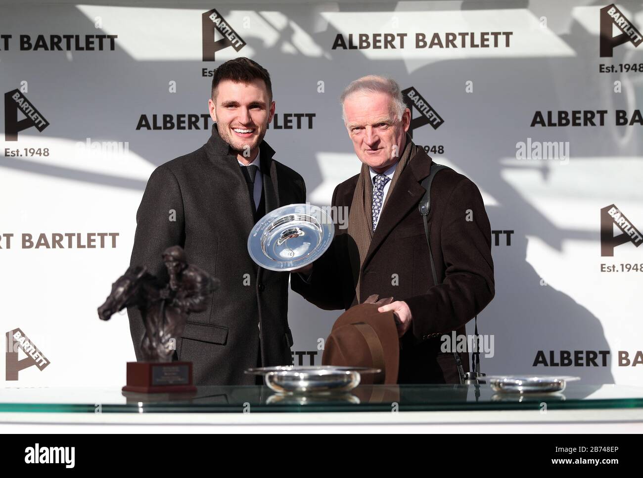 Trainer Willie Mullins (right) after Monkfish won the Albert Bartlett Novices' Hurdle during day four of the Cheltenham Festival at Cheltenham Racecourse. Stock Photo