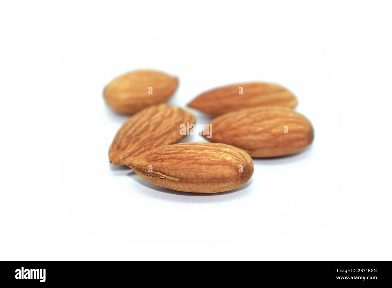 Almond isolated on white background Stock Photo - Alamy