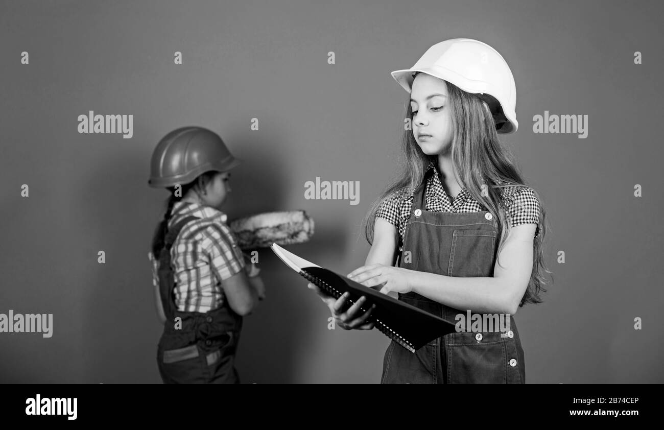 Image showcasing Kids girls planning renovation. Repaint walls. Move in new apartment ...