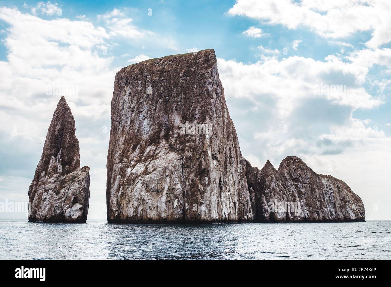 Kicker Rock in the Galapagos Islands, a key snorkeling and diving spot for tourists, with the 300m drop being home to hammerhead sharks, reef sharks, Stock Photo