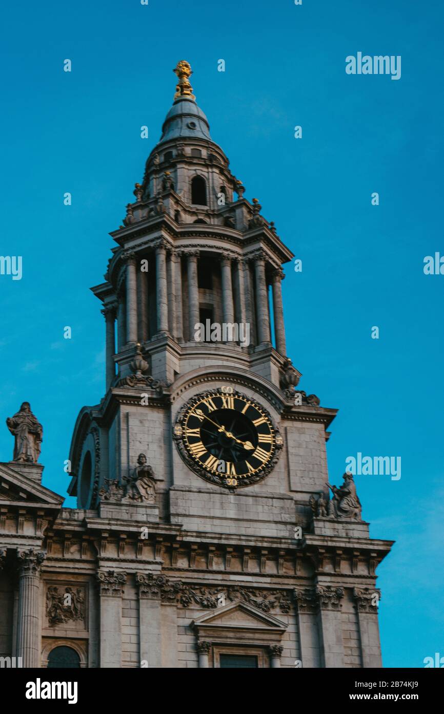 Vertical shot of the St. Paul's Cathedral in the UK under a blue sky Stock Photo