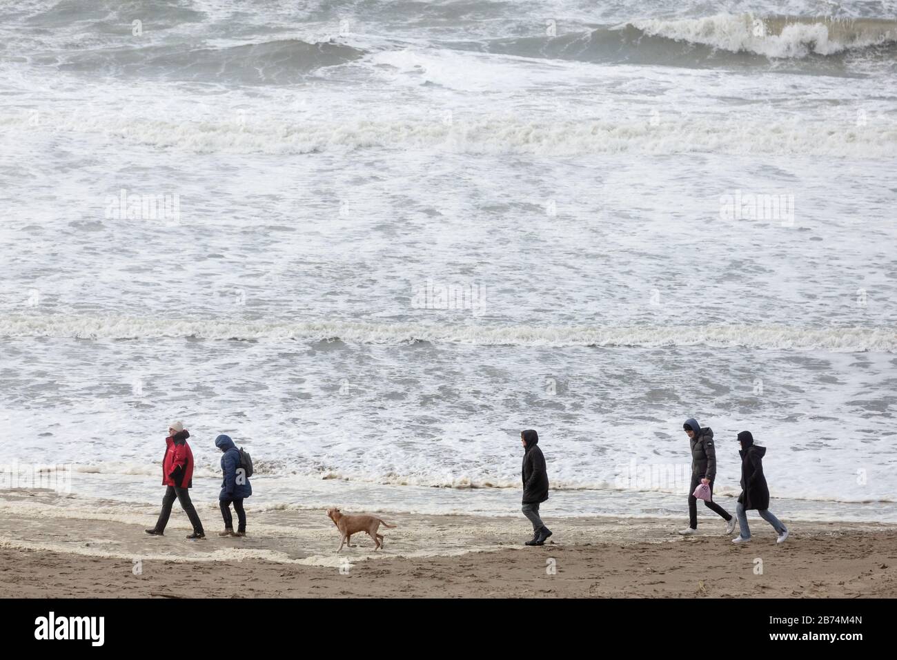 Bloemendaal aan Zee, Netherlands - February 23, 2020: beach at the Northern Sea with unidentified people. Bloemendaal aan Zee is a popular beach desti Stock Photo