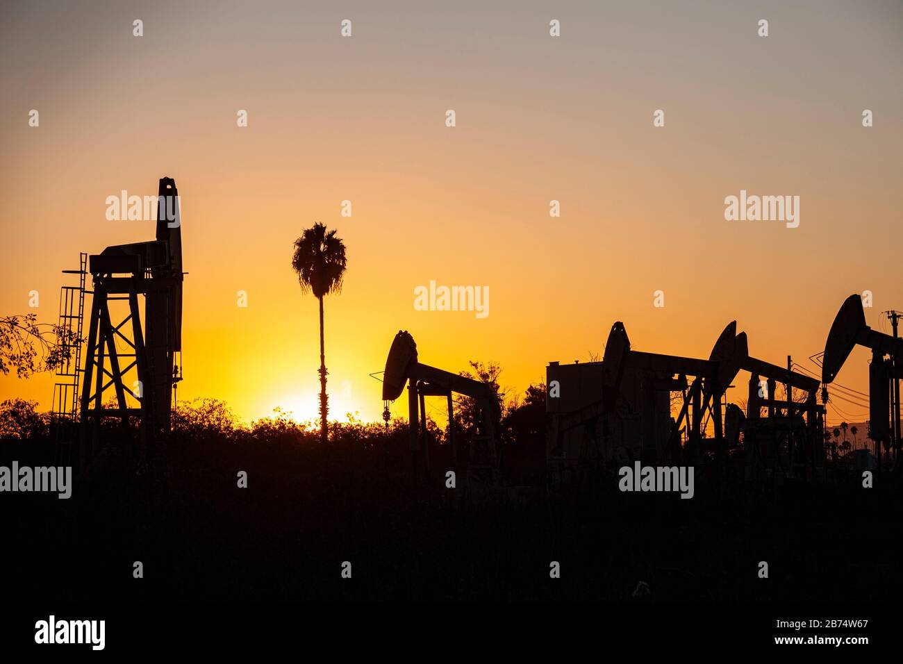 Oil pumpjacks in the Los Cerritos Wetlands, Long Beach, california, USA