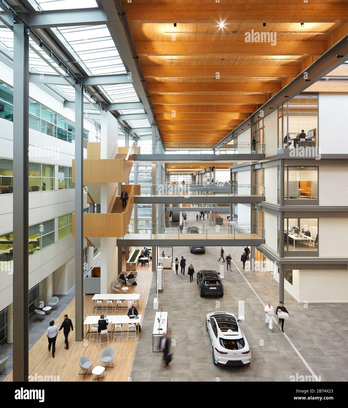 View across central internal street with current car models on