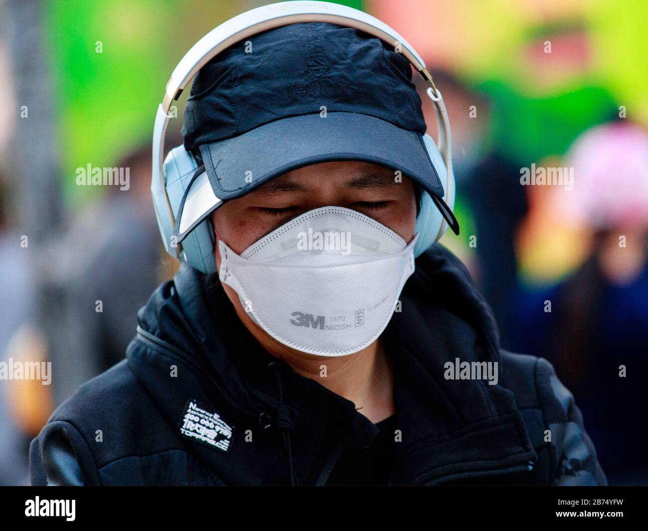 People wear surgical mask in Hong Kong to protect themselves from Coronavirus infection. So far, 10 cases of infection is confirmed. Stock Photo