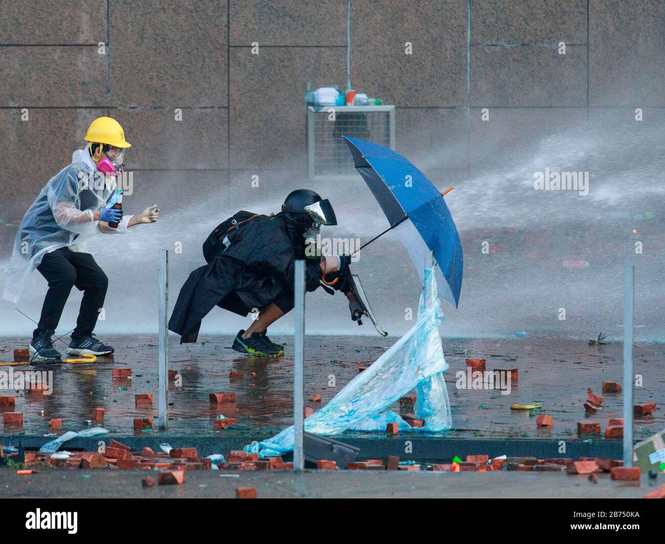 Protesters clash with police at the Hong Kong Polytechnic University. Stock Photo