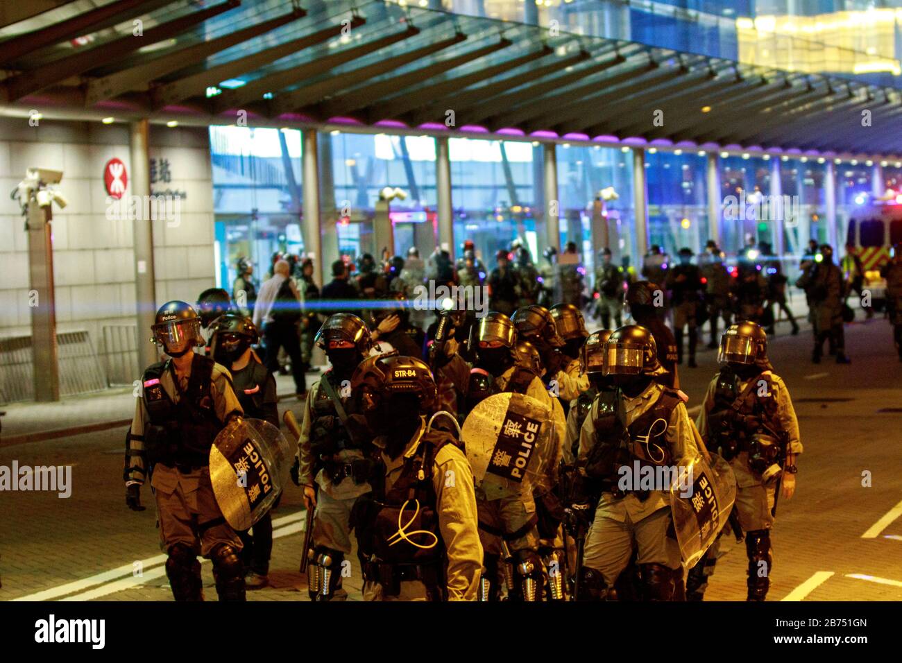 Police stand off with protesters at an officially approved demonstration. Thousands rally pleading with American lawmakers for the second time to pass legislation that supports Hong Kong's democratic movement. Stock Photo