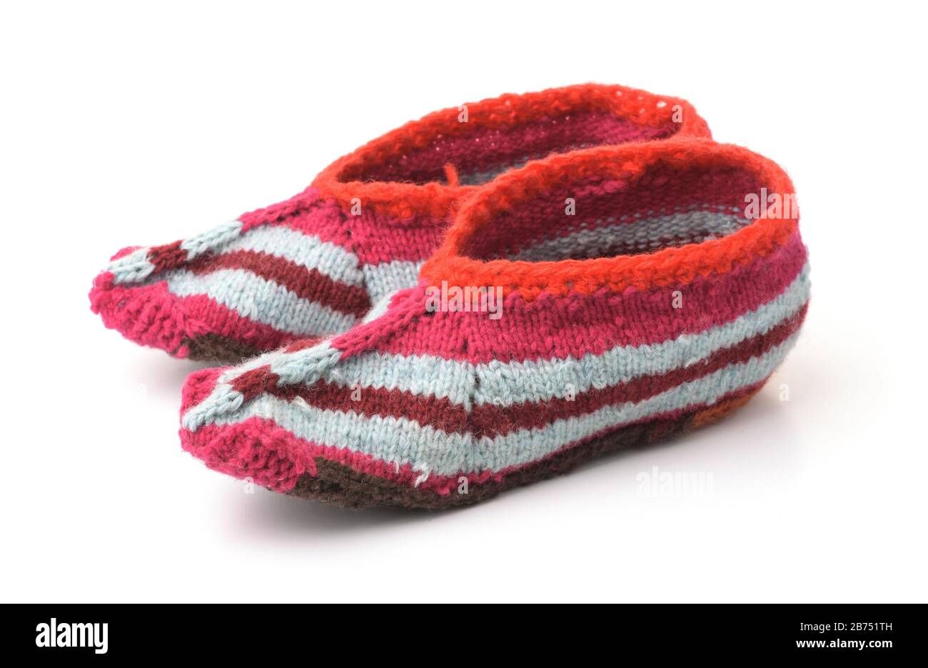 Hand knitted slipper socks isolated on white Stock Photo