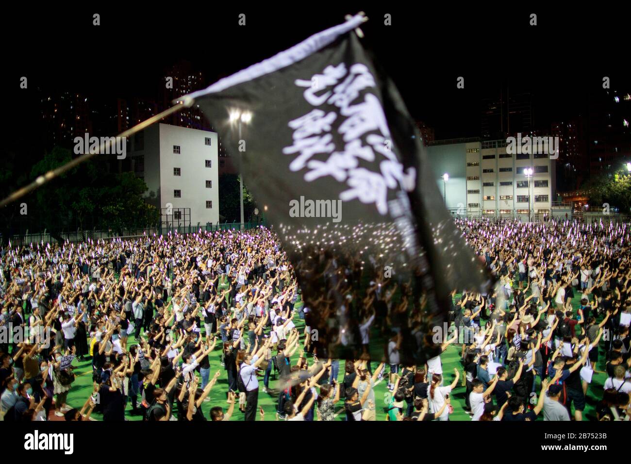 A Protester Swing A Flag Reads Liberate Hong Kong Revolution Of Our Times Hundreds Of People Gather To Protest A High School Student Shot With Live Round By Police Yesterday 1 Oct 2019
