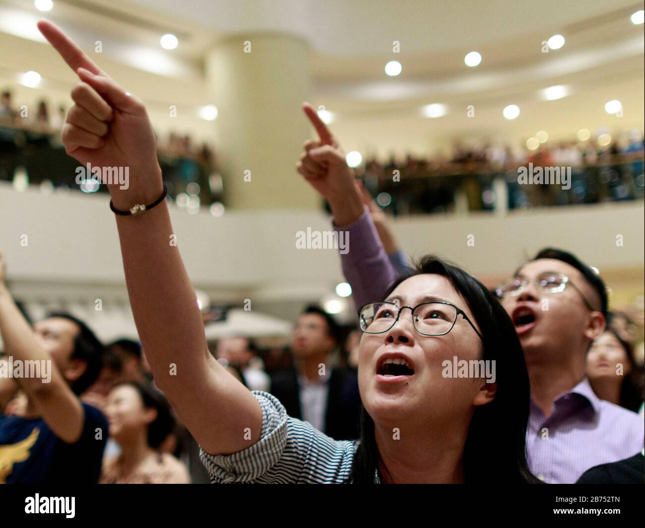 Pro-China protesters from mainland China confront anti-govenment protesters at Pacific Place in Hong Kong. Stock Photo