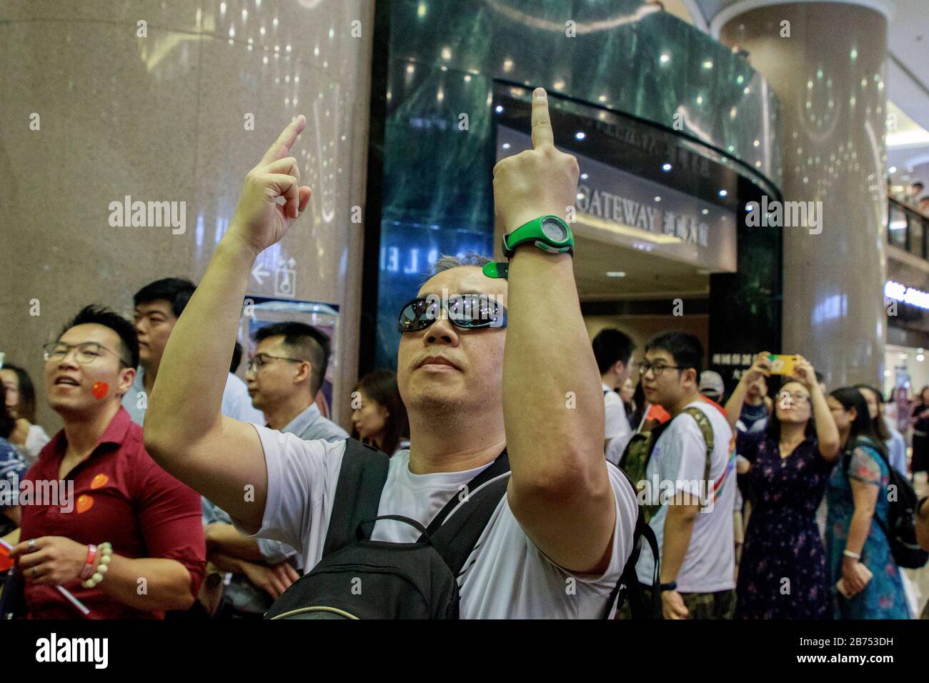 ProChina protesters waves Chinese national flag and confront