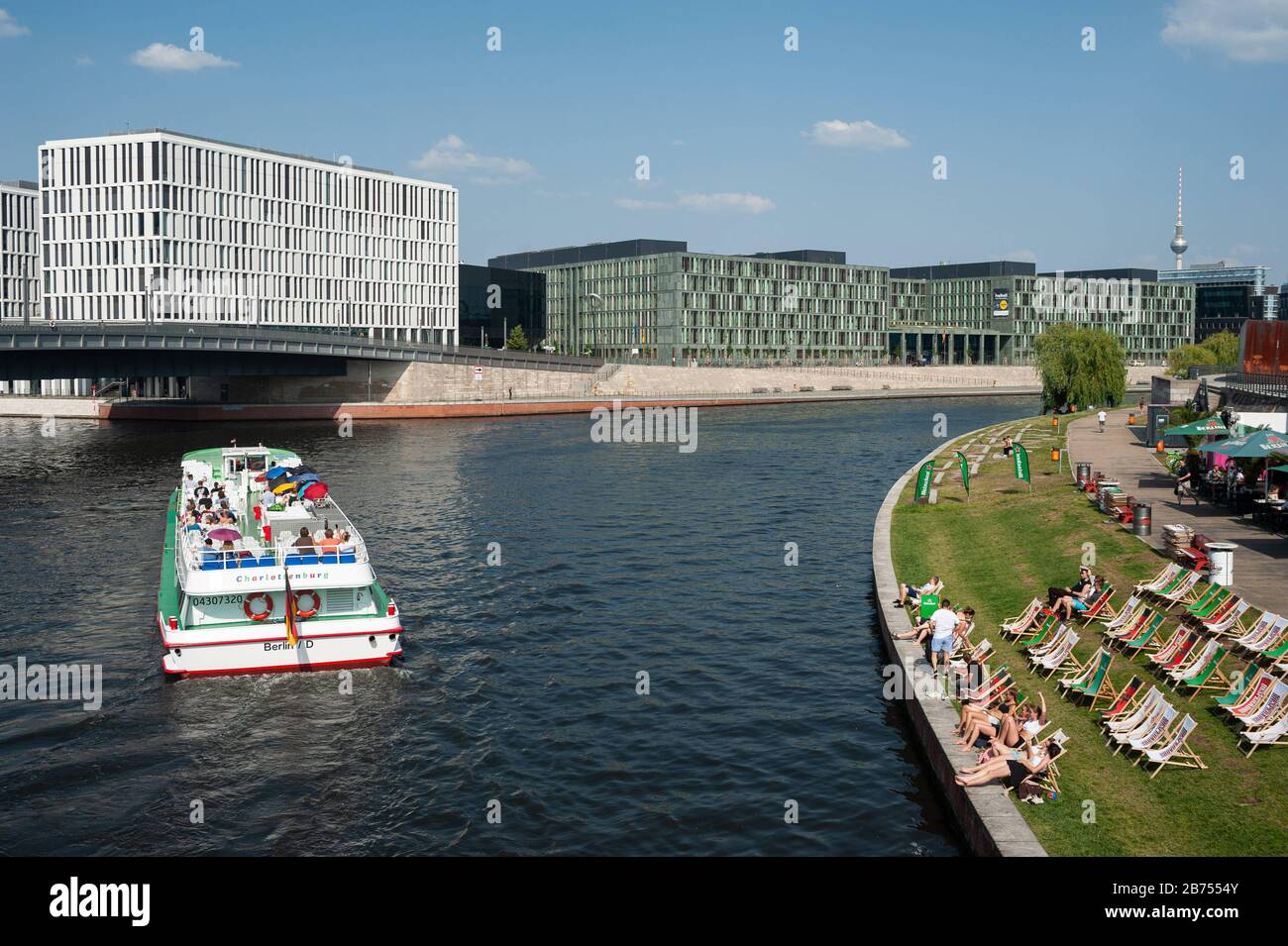 12.06.2019, Berlin, Germany, Europe - Beach bar Capital Beach at the Ludwig-Erhard-Ufer along the river Spree in the government quarter in Mitte. In the distance one can see the television tower at Alexanderplatz. [automated translation] Stock Photo