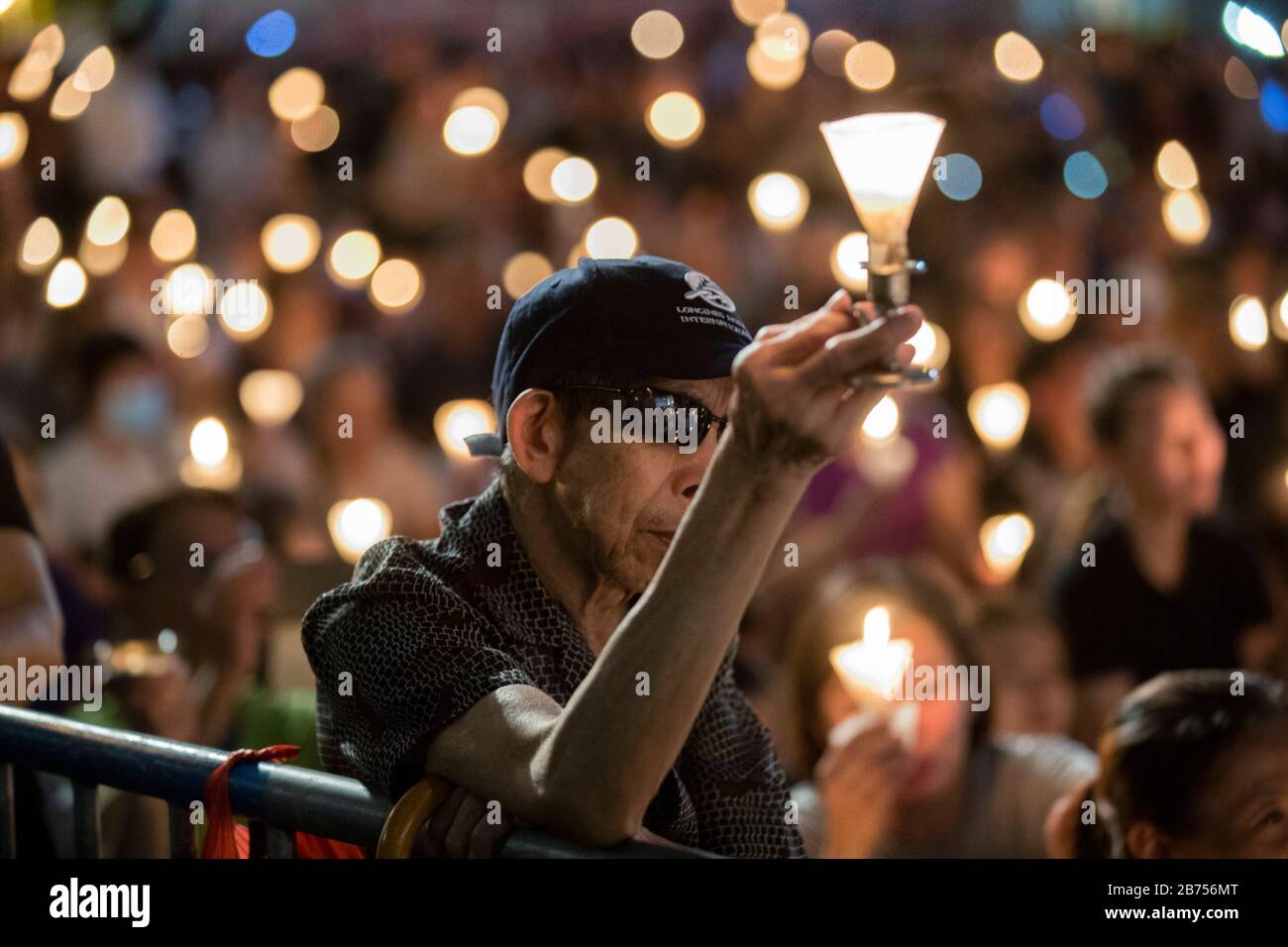 Participants attend the annual candlelit vigil commemorating the 30th anniversary of the 1989 Beijing Tiananmen Square massacre at Victoria Park In Hong Kong, China, 4 June 2019. Stock Photo