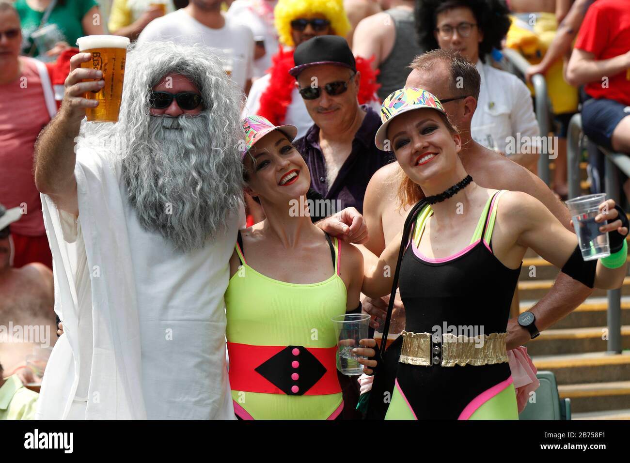 Fans attend the HSBC World Rugby Sevens Series on Day 2 at Hong Kong Stadium. Stock Photo