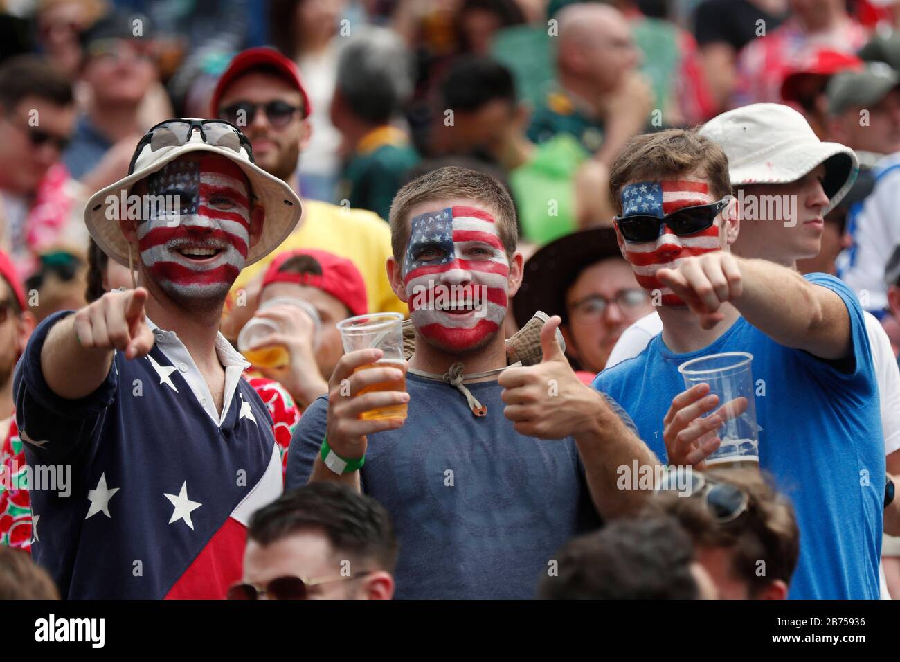 Fans attend the HSBC World Rugby Sevens Series on Day 3 at Hong Kong Stadium. Stock Photo