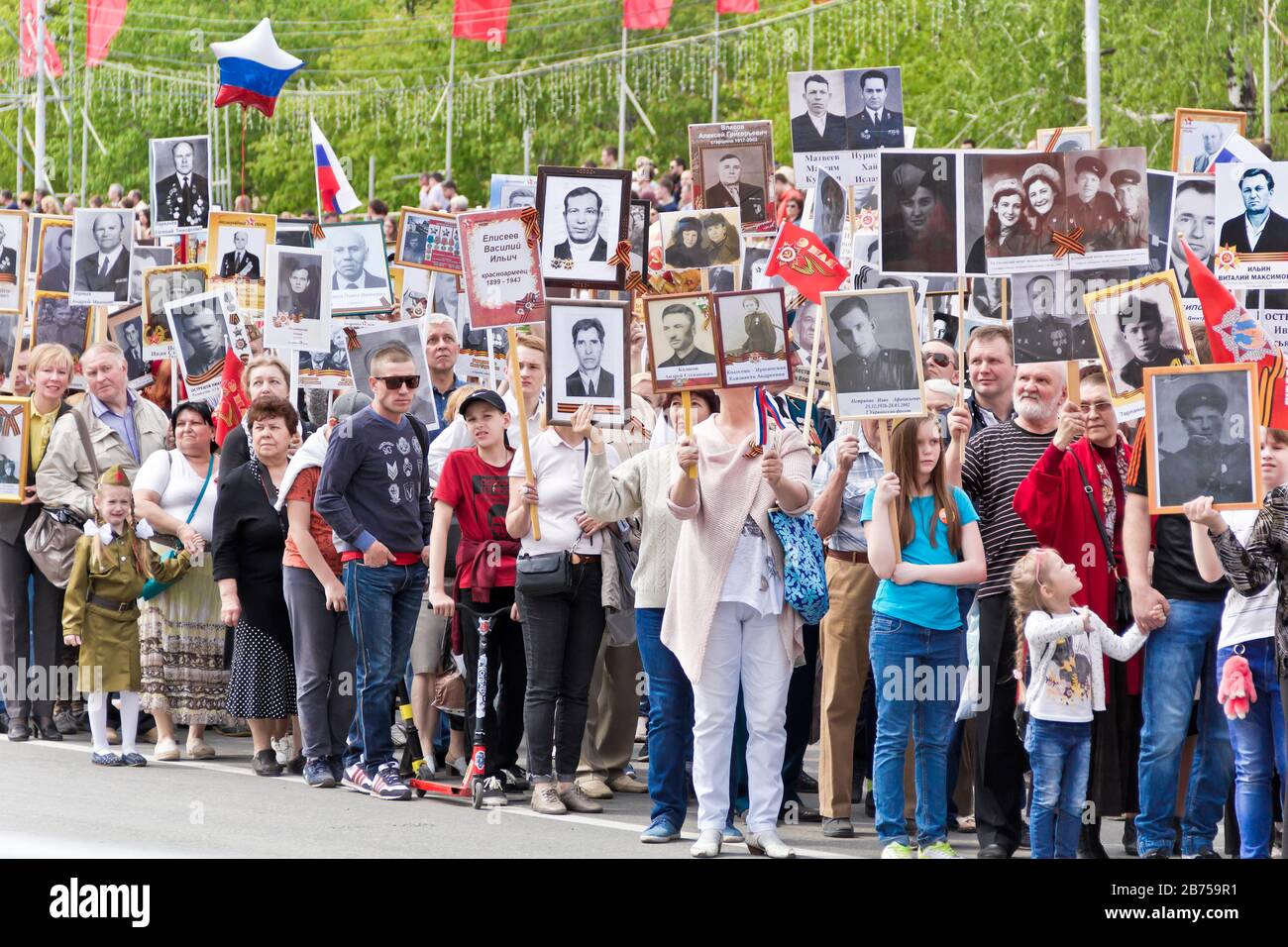 SAMARA, RUSSIA - MAY 9, 2017:  Procession of the people in Immortal Regiment on annual Victory Day, May, 9, 2017 in Samara, Russia Stock Photo