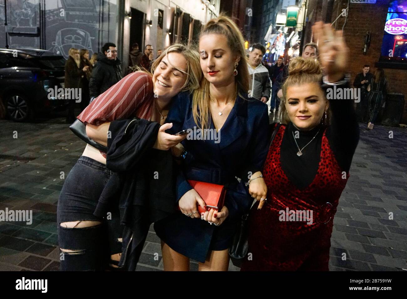 nightlive-women-in-mathew-street-liverpools-party-mile-on-02032019-it-is-not-yet-clear-how-the-brexite-will-be-carried-out-the-british-house-of-commons-will-vote-on-a-possible-postponement-of-the-brexit-automated-translation-2B759YW.jpg