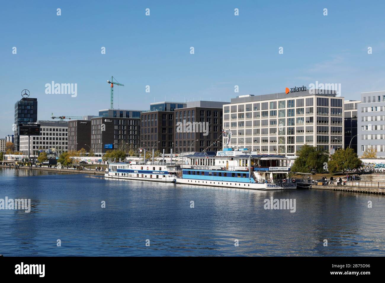 View over the Spree river to an administration building of Zalando AG in  the Mediaspree area. Ten years ago, the initiative "Sink Mediaspree" was  founded against the development of Berlin's Spree riverbank. [