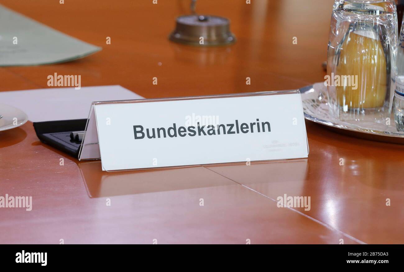 'Chancellor' is written on a sign in front of the seat of Chancellor Angela Merkel in the Chancellery. Merkel is resigning as CDU party leader, and she does not want to extend her chancellorship either. [automated translation] Stock Photo