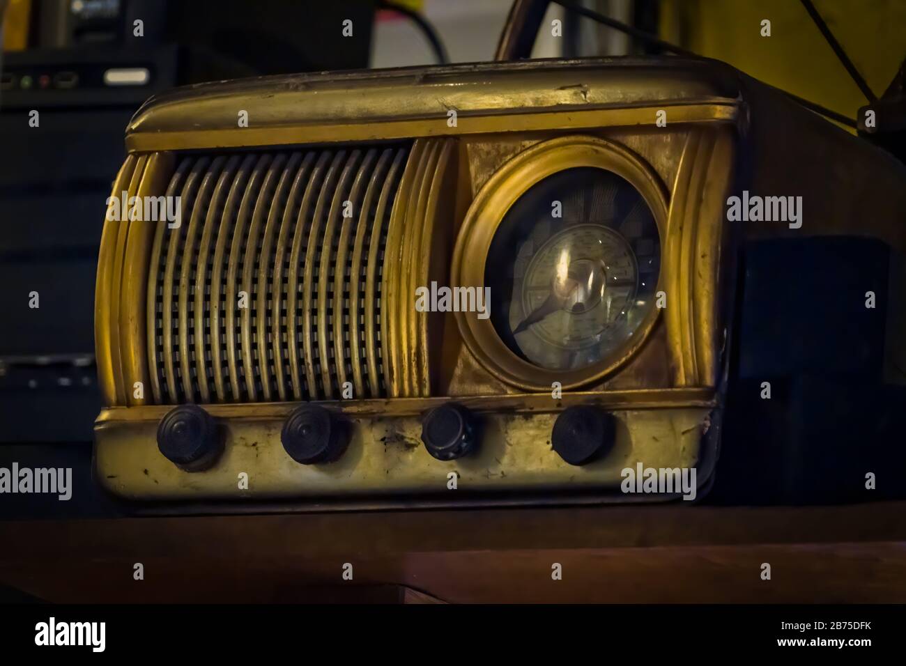 Old vintage radio receiver of the last century with rustic clock build